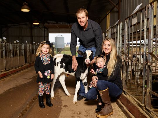 Dairy farmer and environmental scientist Tara Vander Dussen with her family on their farm, Rajen Dairy.