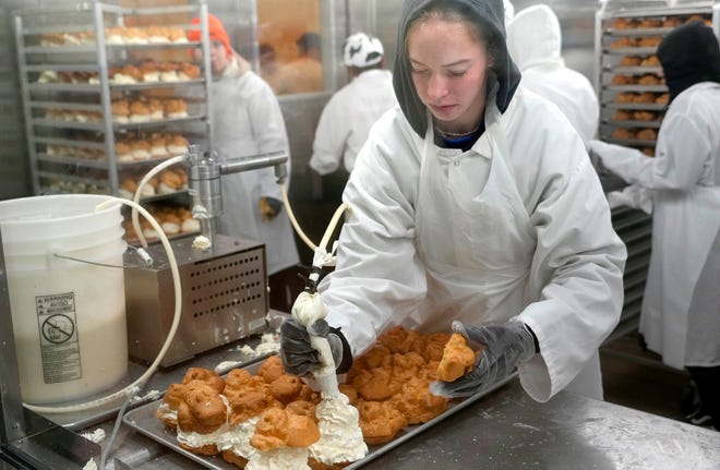 Wisconsin State Fair cream puffs are made fresh each day inside the Cream Puff Pavilion.
