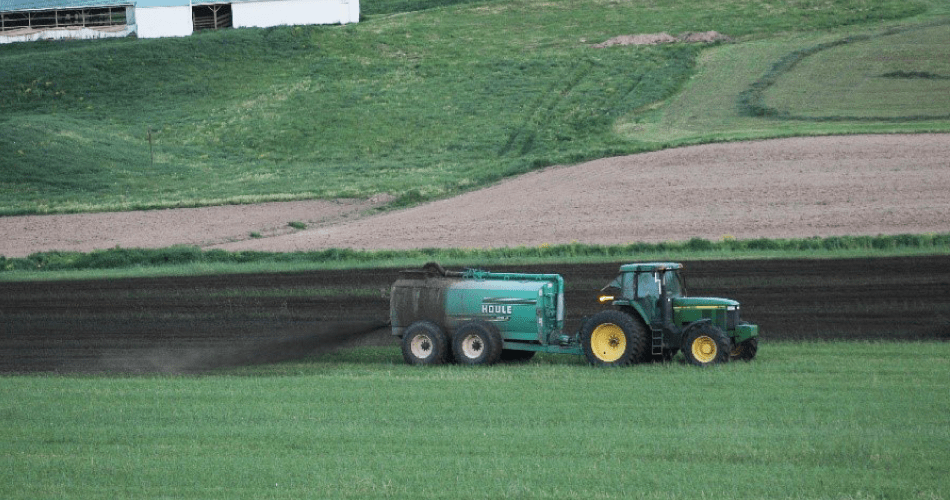 Tractor spreading manure